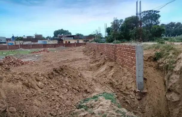 Boundary wall construction in progress at The Ridge, Kurali