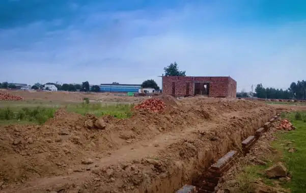 Landscaping and trenching work in progress at The Ridge, Kurali