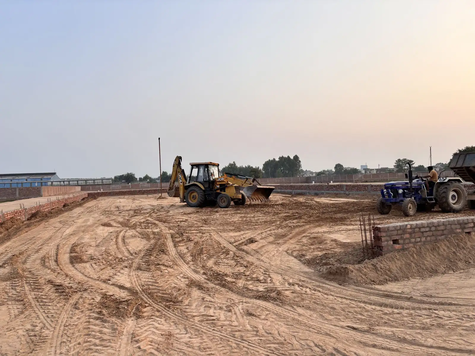 Road construction machinery at The Ridge residential township in Kurali